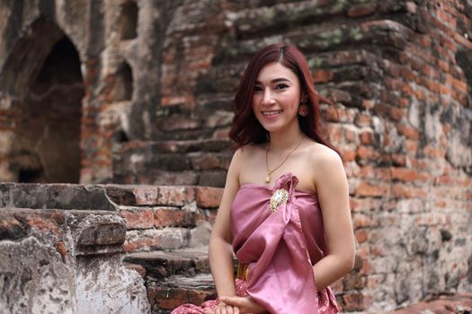 Female in Thai traditional dress at  historical park