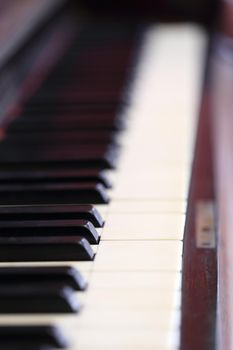 piano keys and wood grain (soft focus) 
