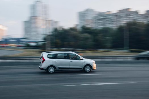 Ukraine, Kyiv - 2 June 2021: White Dacia Lodgy car moving on the street. Editorial