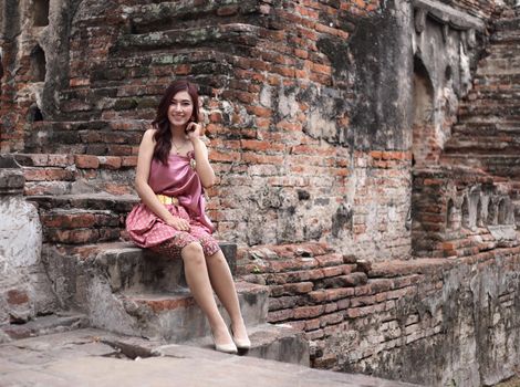 Female in Thai traditional dress at  historical park