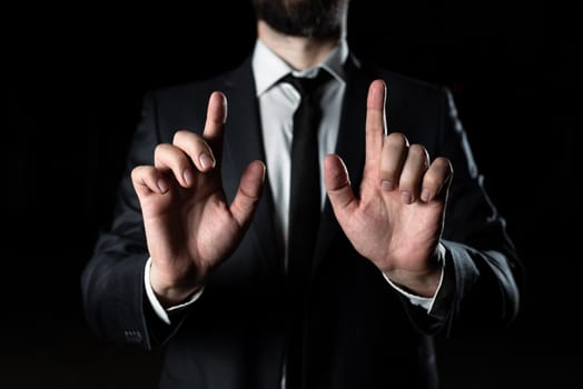 Businessman Pointing Crutial Informations With Two Fingers.