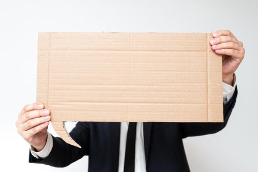 Businessman Holding Speech Bubble With Important Informations.