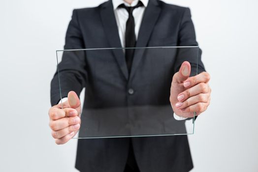 Businessman Holding Transparent Glass And Promoting The Company Brand.