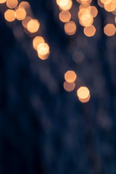 Abstract background texture with light flare and sparks on blue night color.