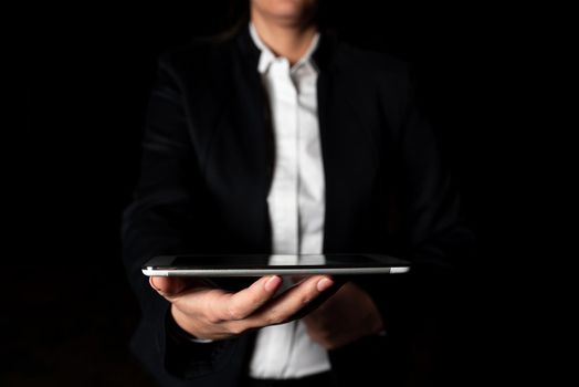 Businesswoman Holding Cellphone And Presenting Important Informations.