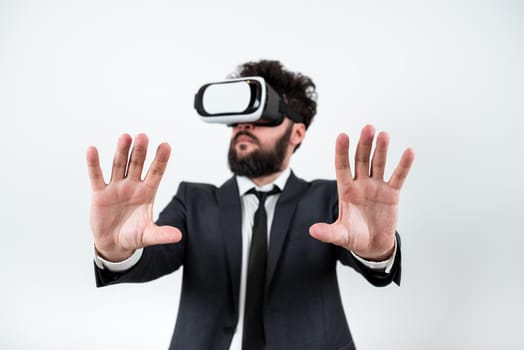 Man Wearing Vr Glasses Andpresenting Important Messages Between Hands.