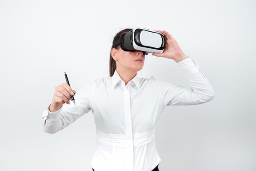 Woman Wearing Vr Glasses And Pointing On Recent Updates With Pen.