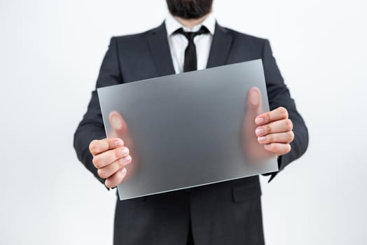 Man Holding Blank Placard And Representing Business Advertisement.