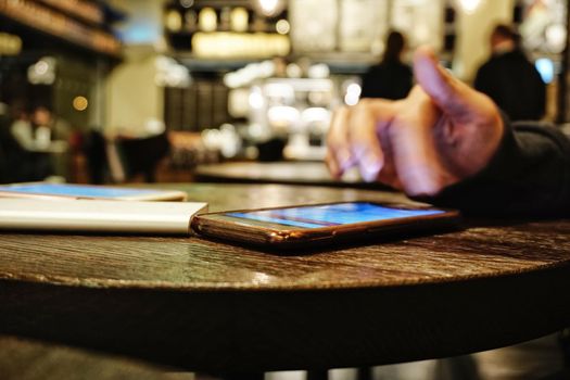 Smartphone using fingers on the touch screen close up
