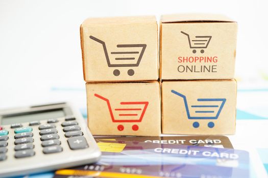 Online shopping, Shopping cart box on business graph, import export, finance commerce.