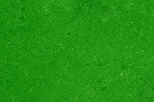 Texturized green putty.Abstract background for design, place for text.