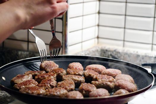 Meatballs cooking preparation at home close up