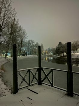 Frozen Porsuk river in Eskisehir at Kanlikavak park at night snow scenes