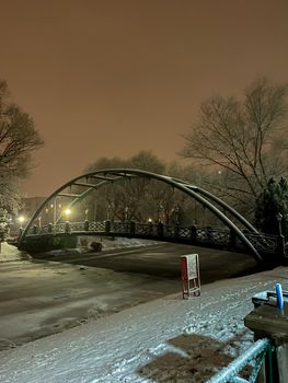 Frozen Porsuk river in Eskisehir at Kanlikavak park at night snow scenes