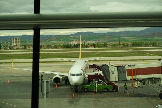 7 May 2022 Ankara Turkey. Boarding Pegasus airlines plane with ramp on Esenboga airport