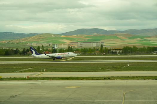 7 May 2022 Ankara Turkey. Anadolu jet boeing landing on Esenboga airport with smoking tires