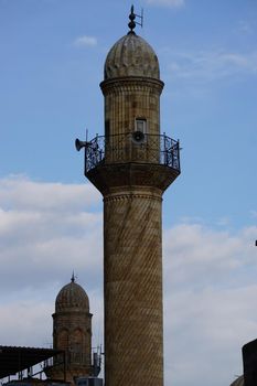 Artuklu Mardin, Turkey 7 May 2022 Mardin landscape at sunset with minaret of Ulu Cami, also known as Great mosque of Mardin