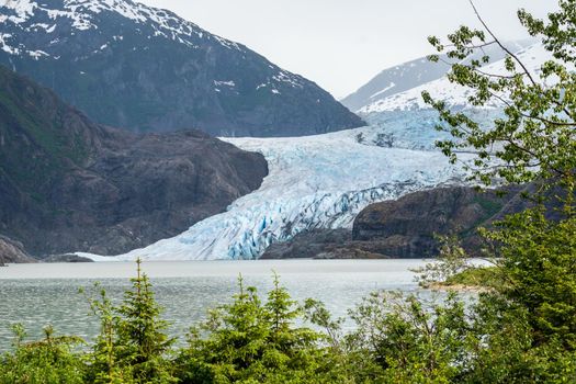 Close up of crevasses on the Mendenhall Glacier as it enters lake close to Juneau in Alaska