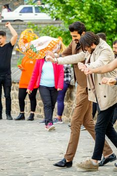 8 May 2022 Diyarbakir Turkey. People playing halay with drum and zurna on ten eyed bridge