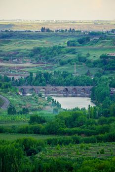 8 May 2022 Diyarbakir Turkey. Ten eyed ongozlu bridge on Dicle river in Diyarbakir view from City walls