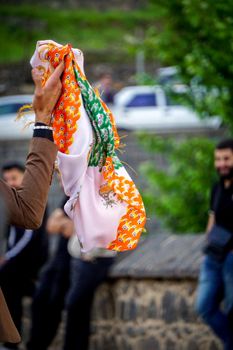 8 May 2022 Diyarbakir Turkey. People playing halay with drum and zurna on ten eyed bridge