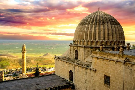 Artuklu Mardin, Turkey 7 May 2022 Mardin landscape at sunset with minaret of Ulu Cami, view from Zinciriye Madrasah