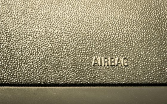 Passenger airbag on car console close up view