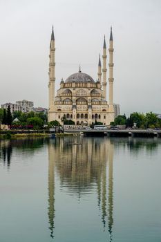 14 May 2022 Adana Turkey. Sabanci mosque and Seyhan river on a cloudy day