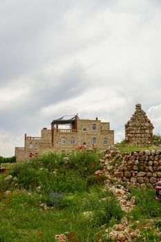 12 May 2022 Elbegendi village Midyat Mardin Turkey. Church and cityscape of elbegendi village in Midyat