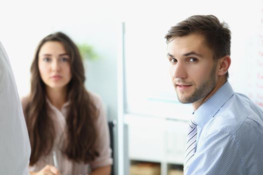 Portrait of man business employee on workplace, clerk look in camera on conference meeting. White collar worker in office. Business, growth, career concept