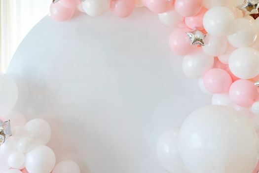 frame on a white background of pink and white balloons.