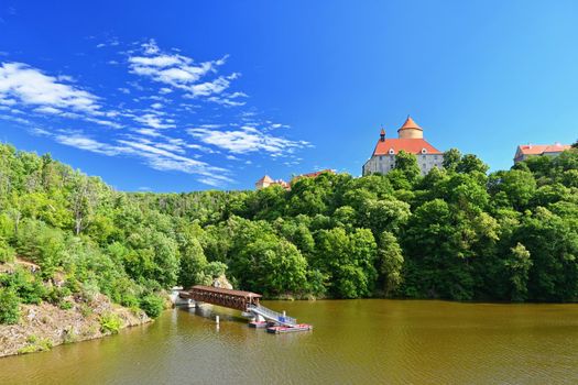 Beautiful old castle Veveri. Landscape with water on the Brno dam during summer holidays on a sunny day. Czech Republic - Brno. 