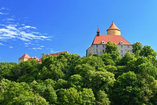 Beautiful old castle Veveri. Landscape with water on the Brno dam during summer holidays on a sunny day. Czech Republic - Brno. 