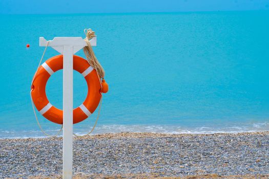 Life mexico summer sky preserver beach sea save red lifebuoy, for belt rope from sand from safe aid, vacation support. Circle seascape scenery, horizon