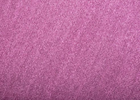 closeup of seamless pink knitted fabric texture