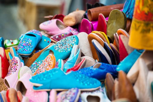colorful slippers are sold in the bazaar