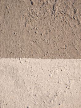 Texture of two different shades on the wall.