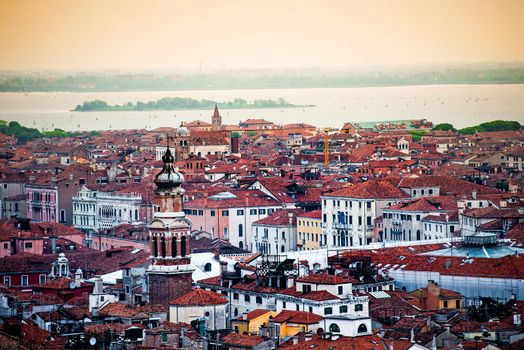 Aerial view of Venice. Houses, sea and palases from San Marco tower