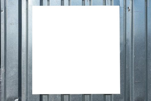 White isolated banner on corrugated zinc fence.