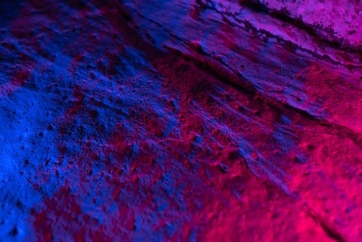 neon texture of granite white rock in bright neon lighting