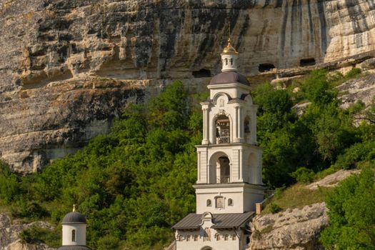 Ancient city chufut road cave bakhchisaray crimea medieval kale monument, concept history sky in sight and travel chufut, mountain landmark. Town scene stony,