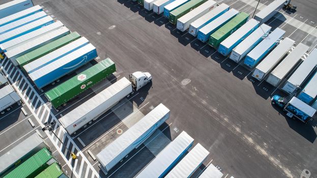 NAMPA, IDAHO - MARCH 21, 2021: Aerial view of the walmart distribution parking lot with truck trailers lined up