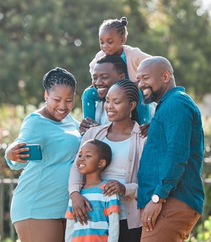 Gran always have the whole family as her profile picture. a multi-generational family taking a selfie together