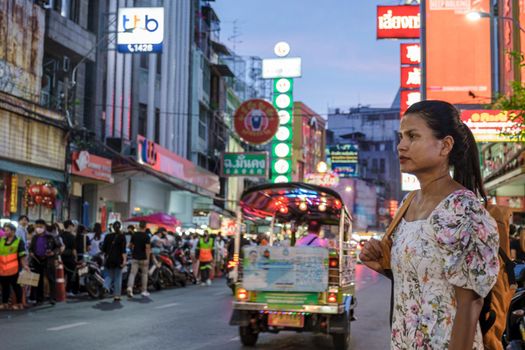 China town Bangkok Thailand, colorful streets of China Town Bangkok.Asian woman with bag, tourist visiting Chinatown