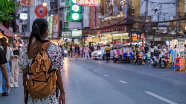 China town Bangkok Thailand, colorful streets of China Town Bangkok.Asian woman with bag, tourist visiting Chinatown