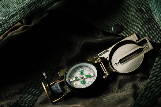 closeup military style of compass for military or camping.