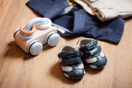 closeup little blue shoes for baby, baby clothing, baby accessories