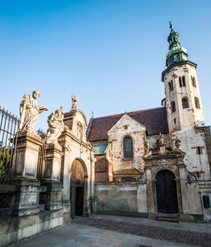 KRAKOW, POLAND - AUGUST 24: The early Baroque Church of St. Peter and St. Paul and the statues of the twelve apostles on Grodzka in the city of Krakow in Poland on 24 august 2013. Dates from 1596.