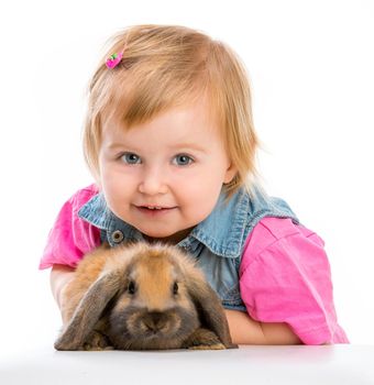 cute little baby and brown easter bunny on white background
