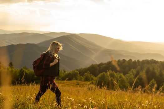 woman backpacker enjoy the view at mountain.